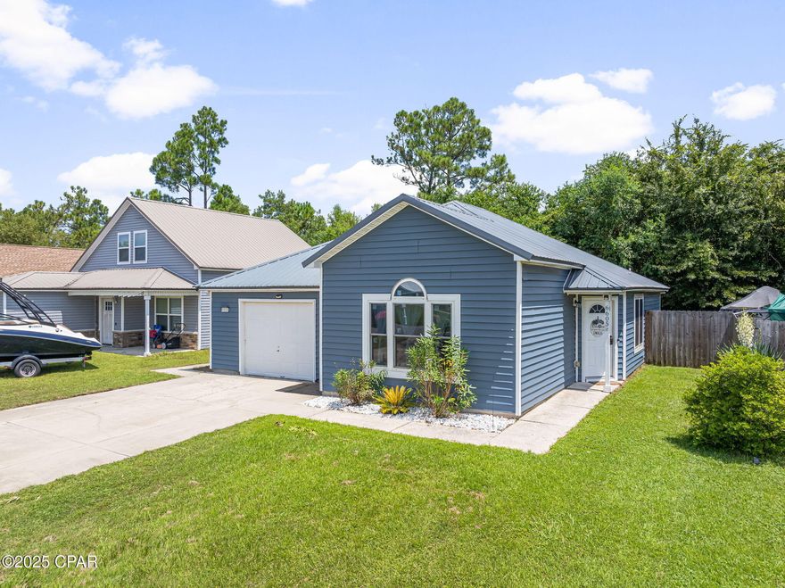 CURRENTLY UNDER CONTRACT, SELLER WILL CONSIDER BACKUP OFFERS

Welcome to this charming 3-bedroom, 2-bathroom home with a 1-car garage, located in the desirable SweetWater Village community. This well-maintained property offers a functional layout designed for comfort and convenience. not to mention an assumable VA loan! 

Step inside to find a bright and inviting main living area filled with natural light. The kitchen features a breakfast bar, ample cabinetry, stainless steel appliances, and a brand-new sliding glass door that opens to the patio—perfect for indoor-to-outdoor living. New vinyl windows throughout the home enhance efficiency and style. This home also features a heavy duty metal roof, new fencing and a patio addition. 

The spacious master includes a private bathroom for your retreat, while two additional bedrooms and a full bathroom provide plenty of room for family, guests, or a home office. The fenced backyard offers privacy and space for outdoor activities, with a patio ideal for entertaining or relaxing.

Located just 19 miles from Tyndall Air Force Base and 30 miles from Panama City Beach, this home is also close to shopping, dining, schools, and entertainment. An assumable VA loan makes this an excellent opportunity for qualified buyers.

If you are looking for a great investment opportunity this home would make a great first step. 

Don't miss the chance to make this beautiful home your own—schedule a showing today!