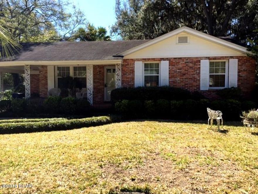 Great 3 bedroom 2 bath home in the heart of the Cove, which is rich with charm and tradition.  Home is situated on a beautiful lot with lush landscaping and mature trees providing for welcome shade to the entire property.  Home offers a very spacious living and family room complete with a fireplace, all bedrooms are nice a very nice size, original hardwood flooring  under some of the carpets and an inside laundry room.  You will enjoy your morning cup of coffee on the 12x13 enclosed back porch, to maintain the lush landscaping there a sprinkler system and a well.  This home as been well maintained and is close to the Historical Downtown District, hospitals, schools and shopping. All ages, sized including sq. ft. are approx. measure if important.  This house won't last long!!!