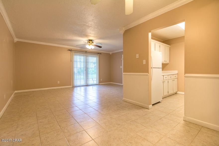 By far the best deal available for a 3bedroom/2bath in Landmark. You have to see this gorgeous condo nestled away in the beautiful St. Andrews/Downtown area. The convenience of Panama City's Downtown is great as it's full of shopping, restaurants, entertainment, and the marvelous downtown marina. Landmark includes amenities such as a bay front pool, private dock for fishing, private beach, picnic area, and a club house. Enjoy a walk on your private dock or watch the magnificent sunsets on your private beach. The HOA includes water, sewer, trash, extended basic cable, and required insurance. This spacious unit is located on the first floor and includes its own private patio.  You will love the size of the master bathroom and the large master bedroom. This angelic unit has tile floors throughout the living room, dining area, and bathrooms. This condo is turn-key and ready for you to move in!
