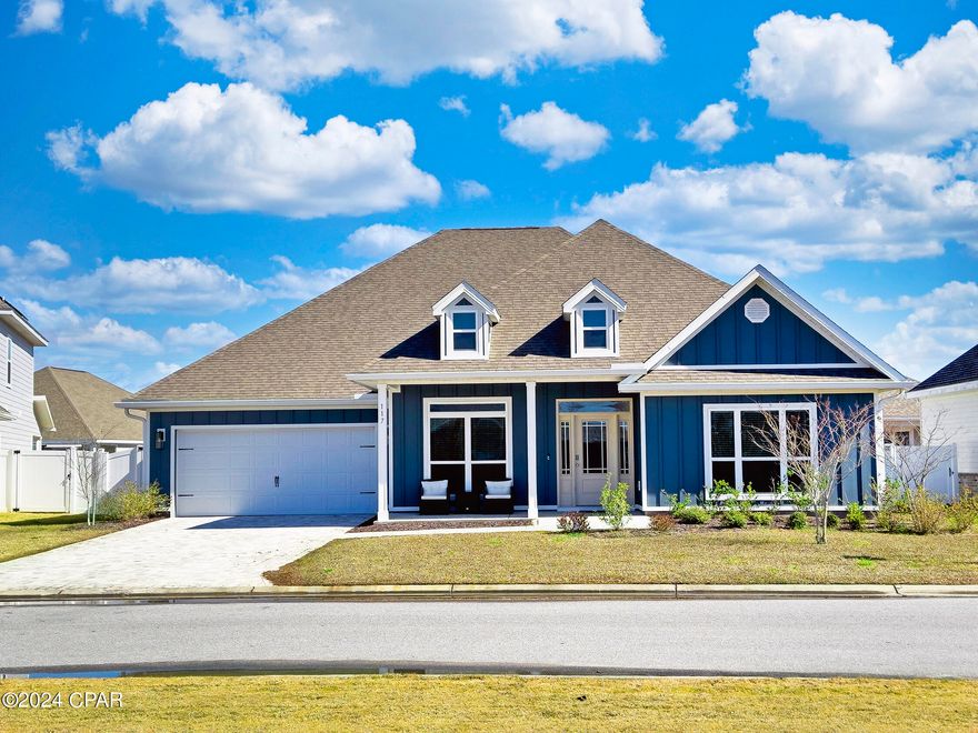 CURRENTLY UNDER CONTRACT, SELLER WILL CONSIDER BACKUP OFFERS  This one's a stunner! You will feel amazed upon entering this 5 BR 3 Bath home with an open floor plan. It has many CUSTOM upgrades, including crown molding, raised ceilings and trey layers in multiple rooms. This is paired with over 3100 square feet of living area and a separate contemporary office that provide a comfortable and spacious atmosphere perfect for entertaining guests or relaxing with your family. Granite countertops, subway tile, custom cabinets, built in oven and microwave, and a large amount of countertop space make this a dream kitchen. The master suite will make you fall in love with this home. It features granite with double vanities, walk-in tile shower, garden tub, and a oversized walk-in master closet that is beautifully done with custom shelving and organization system. The covered patio is a great place to unwind, or work in the large fenced backyard. This home is nestled within a gated community and is walking distance to a park and community area the whole family can enjoy. It is a short drive to a multitude of shops and restaurants and a short drive to Tyndall Air Force Base. This is a home you absolutely must see to appreciate! Don't miss the opportunity. Call your favorite realtor today to schedule a private showing.