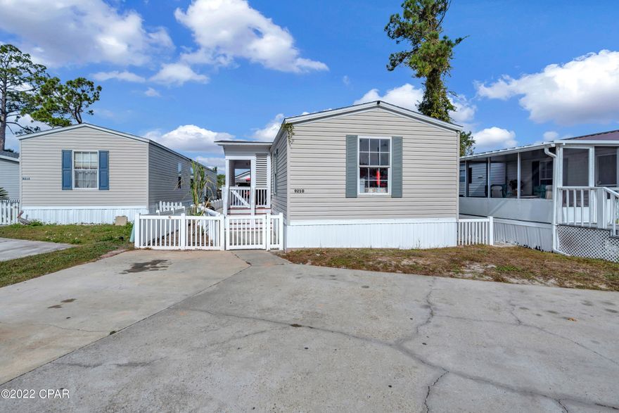 THIS IS A GREAT DEAL AT THE BEACH!!! IT HAS A FANTASTIC 3 BEDROOMS AND 2 BATHROOMS.  Also, has a LARGE storage room area on the back patio.  The Kitchen has plenty of room and has a kitchen island for more space.  The master bedroom has the master bath with a garden tub and separate shower and its walk-in closet.  This subdivision is very family oriented.  It's all gated with a precious white picket fence. 

If you have any question, please do not hesitate to call any of your favorite realtors.