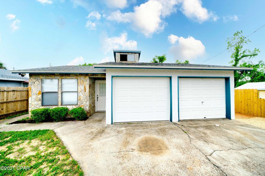 'CURRENTLY UNDER CONTRACT, SELLER ACCEPTING BACKUP OFFERS' This beautifully remodeled 3 bed, 2 bath home is located near TAFB, with a one car garage and an enclosed H/C area which can be used as and office, extra storage space or laundry room.  This home welcomes you in to a large living area boasting beautiful oversized tile flooring and a wood-burning stone fireplace perfect for relaxing nights with family.  There's also a den area with tile flooring which could be used as an office space.  The eat-in kitchen features stainless steel appliances, granite countertops, and plenty of brand new cabinet space for your convenience.  The spacious master bedroom boasts its own private ensuite with a shower/tub combo, tiling, and a new vanity. This home also has a huge, fenced-in backyard with plenty of space for a large shed or even just an area to host family and friends.  This home is located near Tyndall Air Force Base, schools, parks, restaurants, and lots more for your convenience. This home is a must-see! 'CURRENTLY UNDER CONTRACT, SELLER ACCEPTING BACKUP OFFERS'