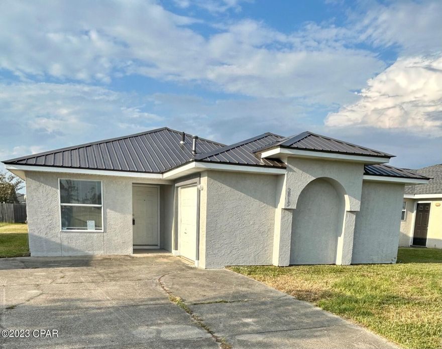Price Reduction!!!! This newly remodeled 3 bedroom 2 bathroom home is now available! Located in close proximity to Panama City limits and Callaway (Tyndall AFB). Improvements include: new metal roof, kitchen with granite countertops, bathrooms, LVP flooring, and water heater. The addition of barn doors complement the spare bedrooms. The A/C is only 2 years old and the insulation was just replaced in the attic. Crown molding in the common areas add a nice touch to this practically new home. The single car garage provides room for your vehicle and an additional space to the left side for more storage. The back yard is spacious and ready for your design ideas. Don't miss your chance to grab this beauty!