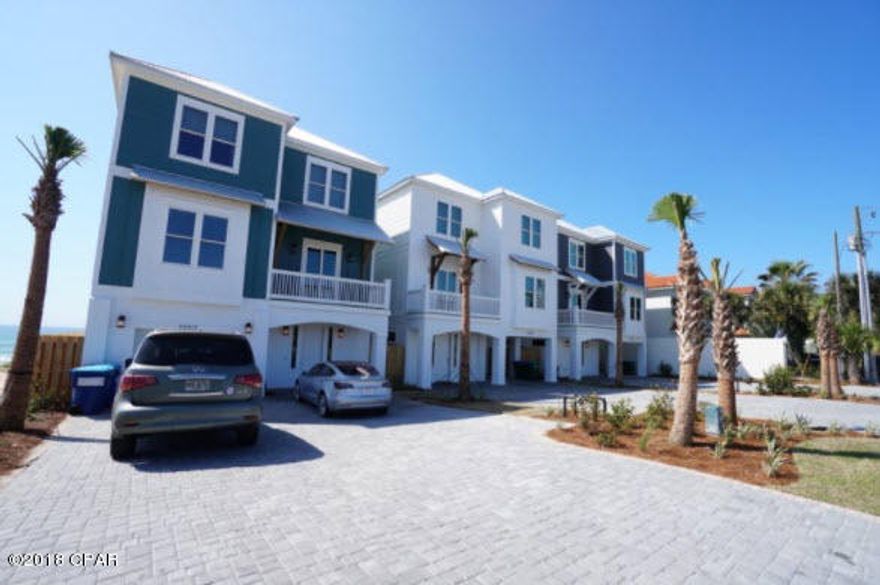 Why pay 30A prices when you can experience the same beautiful beaches and gulf views for millions less! This new gulf front home is the furthest westerly home for sale on Panama City Beach (outside of Carillon Beach). This home sleeps 22 and is 6 bedrooms, 6.5 baths, 3,512 sq. ft. of open living space, and 2nd and 3rd story covered porches that total 956 sq. ft.  This home is being sold fully furnished and ready for rentals with a projected rental income of $220,000. Some interior features include tile floors, large kitchen with open floor plan that has ample space to accommodate family and friends, custom cabinets, breakfast bar, vaulted ceiling, owner closet, and hallway bunk beds.  The gulf facing master bedroom allows you or your renters to wake up, roll over and experience a breathtaking view of paradise.  Master bath has a whirlpool tub and separate shower.  Come enjoy taking a dip in your own private heated pool as the ocean breeze flows over you.  2-2 Â½ ton HVAC units, covered carport with plenty of parking, spray foam installation, high elevated lot and protected concrete seawall. Wired  with a Nema 14-50 custom installed charging outlet for electric cars. House has been equipped with automatic sprinkler system to comply with Florida public and logging regulation as definded by section 509.013(4)(a), at a cost of $30,000 to $40,000. This should result in lower insurance premiums. This home is within 2.5 miles of Inlet beach, 3.5 miles to 30A, and less than 5 mins from Rosemary beach making this the perfect location!
.