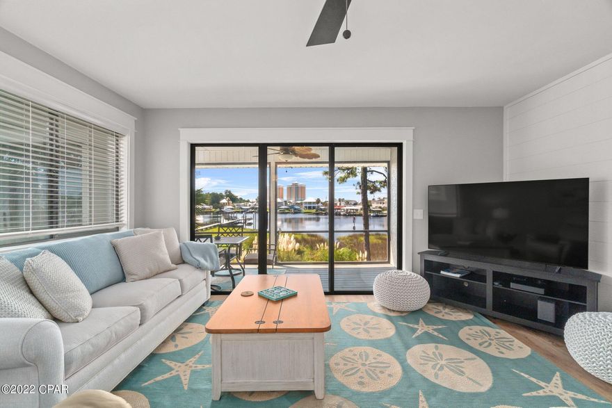 Located on the glistening waters of Grand Lagoon, you have discovered a custom and extensively remodeled condominium inclusive of a deeded boat slip outfitted with a new 10,000 lbs lift as part of the purchase. This top floor, corner unit received over $100,000 in recent improvements and is a rare find. Tour now before the tranquil views and exquisite coastal taste of this waterfront sanctuary belong to someone else.