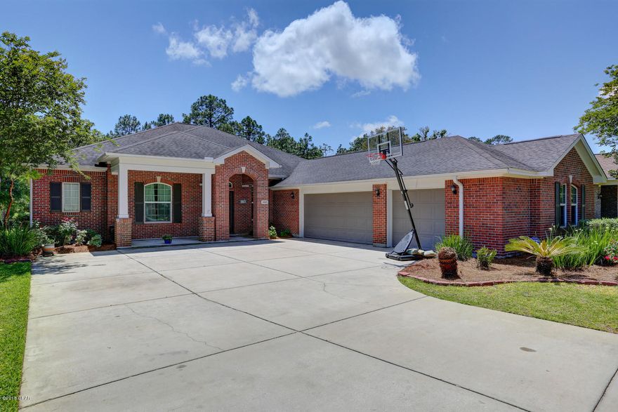 FABULOUS SPACE IN THIS ALL BRICK HM W/BIG SCREENED POOL!! This could easily become a 5 bedrm if needed! A 3 car garage, not often found, gives plenty of room for a workshop or storage, if you don't have 3 cars! Kit boasts TONS of cabinets & granite counter space, lge island w/breakfast bar, breakfast nook & pantry. The huge formal dining area can easily handle a table for 12! Office, across foyer from FDR is open, but could be easily enclosed. All the bedrooms are a good size.  MBR suite has ginormous walk-in closet & MBA has dbl vanity & whirlpool tub.  2 bedrms have a jack & jill bath. The den (or possible 5th bedroom) is a great place to curl up & watch a movie. There is a bath next to the 4th bedrm that conveniently accesses the pool. The pool is screened & has a baby barrier that keeps little ones safe. Laundry room is huge, has built-in cabinets and space to put a "mudroom" area. Very private backyard has a lovely view of a large pond. The home is situated to maximize privacy from the neighbors. One of the best schools in Florida is within walking distance. ALL NEW CARPET, transferable termite bond. RV hook up and utility sink in garage.  All rm sizes, lot sizes, sq ft are estimates. Please measure if concerned.
