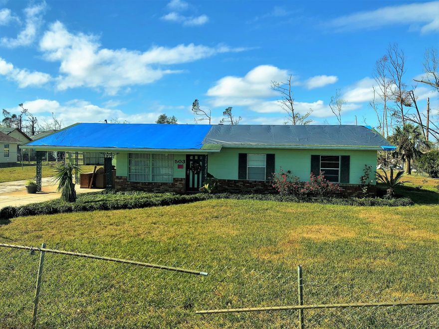 2 PROPERTIES FOR SALE – 503 AND 511 CAMELLIA AVE.  503 Camellia Ave is approximately 1.3 acres and features a block home with 4 bedrooms, 3 baths, over 1900 SF, 2 living areas, a dining area, interior laundry and a carport.  This property was damaged in Hurricane Michael and has had some mitigation done to the home.  511 Camellia Ave is just over an acre and has a storm damaged manufactured home on the property.  Both properties are side by side and are being sold together as-is, how-is, where-is.  Call today for a private preview.  Measurements approximate.