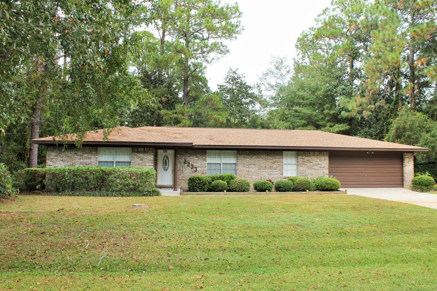 This lovely ranch style 3 bedroom 2 bath brick home in College Point awaits you! The main living area features the kitchen and breakfast area open to the Cozy Family Room featuring a brick fireplace. The formal living room and dining room are combined giving you a large space for entertaining. All three Bedrooms are at one end of the home, master has bath with double vanities, additional bath for other two rooms and guest. Other features are a 2 car garage, covered porch, yard bld., deck with trellis and the best is the htd/cld Florida room! Lots of perks to this home location(just a couple blocks from the neighborhood park on the water), schools, shopping, restaurants,  convenient to Tyndall Air Force Base and much more! *Additional lot next door sold separately call for more information. Call for more information on the additional lot. All room sizes approximate. Please verify if important.