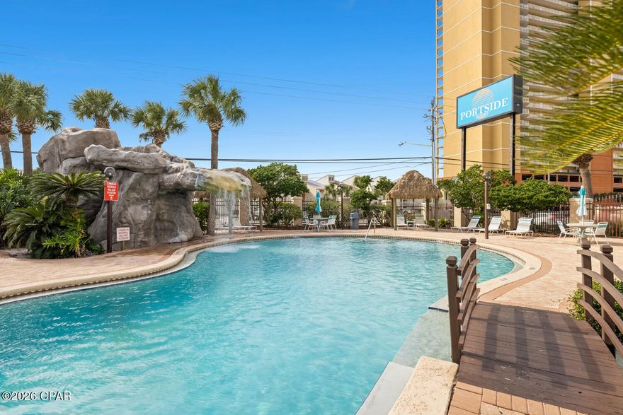 Tucked away in the highly sought after West End of PCB, this charming 2 bedroom, 2.5 bath condo in Portside Resort offers the perfect blend of beachside relaxation, convenience, and investment potential. This rare floor plan stands out with two full bathrooms plus a half bath, a hard to find feature in the community. The spacious primary suite offers its own private bath and balcony, creating the perfect spot to start your day with coffee and coastal breezes. Ideally located within the resort, Unit N5 is near by one of three community pools, including a beautiful waterfall pool and a seasonally heated pool, with plenty of space to kick back and unwind.

Portside offers so many amenities designed for both owners and guests, including a hot tub, tennis and pickleball courts, shuffleboard, horseshoes, a fitness room, and beautifully landscaped grounds. The large clubhouse offers a fun gathering space complete with a pool table, darts, card tables, and a full kitchen, perfect for hosting everything from casual dinners to game nights. Even better, you are directly across from Beach Access 70 and right next door to local favorite Carousel Supermarket, making beach days and quick grocery runs effortless. You are also just minutes from Pier Park, Pirates Voyage Dinner & Show, Topgolf, McGuire's Irish Pub, and the scenic charm of 30A. With similar units producing over $25,000-40000 annually in gross rental income, low HOA fees, and no milestone inspections, this is an incredible opportunity whether you are searching for a smart investment, a second home, or your own personal beach getaway.