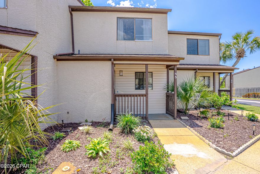 Tucked away in the highly sought after West End of PCB, this charming 2 bedroom, 2.5 bath condo in Portside Resort offers the perfect blend of beachside relaxation, convenience, and investment potential. This rare floor plan stands out with two full bathrooms plus a half bath, a hard to find feature in the community. The spacious primary suite offers its own private bath and balcony, creating the perfect spot to start your day with coffee and coastal breezes. Ideally located within the resort, Unit N5 is near by one of three community pools, including a beautiful waterfall pool and a seasonally heated pool, with plenty of space to kick back and unwind.

Portside offers so many amenities designed for both owners and guests, including a hot tub, tennis and pickleball courts, shuffleboard, horseshoes, a fitness room, and beautifully landscaped grounds. The large clubhouse offers a fun gathering space complete with a pool table, darts, card tables, and a full kitchen, perfect for hosting everything from casual dinners to game nights. Even better, you are directly across from Beach Access 70 and right next door to local favorite Carousel Supermarket, making beach days and quick grocery runs effortless. You are also just minutes from Pier Park, Pirates Voyage Dinner & Show, Topgolf, McGuire's Irish Pub, and the scenic charm of 30A. With similar units producing over $25,000-40000 annually in gross rental income, low HOA fees, and no milestone inspections, this is an incredible opportunity whether you are searching for a smart investment, a second home, or your own personal beach getaway.