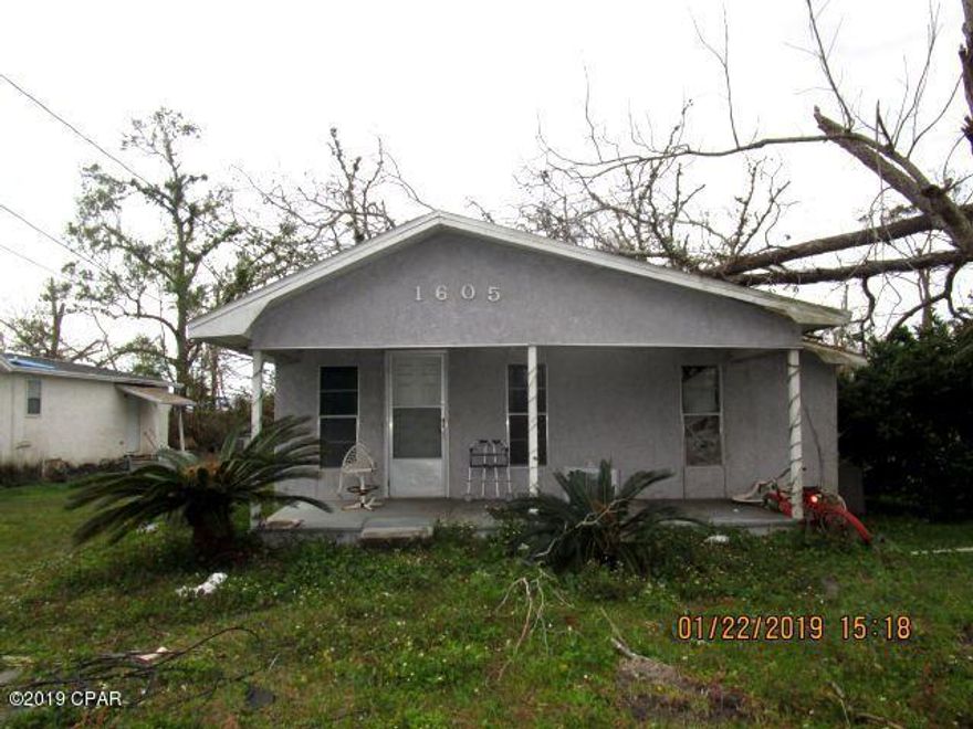 This centrally-located home has significant hurricane and mold damage but appears to be structurally sound.  The home has two bedrooms and one full bath and a spacious yard.  Home being sold in its AS IS condition.