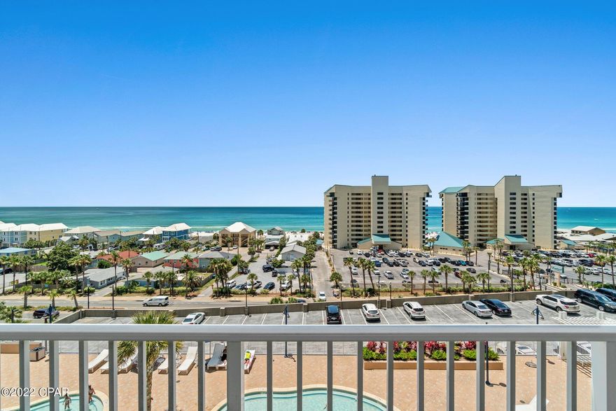 Motivated Seller here! $5000$ buyer credit at closing with acceptable offer. Gorgeous gulf facing view from the balcony.  The unit is beautifully decorated and comes with all furnishings and appliances including Washer and Dryer. Roomy layout with over 1000 sq ft of space to comfortably sleep 6 people. Come enjoy the beach and do not have to leave this general area to have it all.  Amenities galore with 5 pools,  a splash/kiddie area.  Putt Putt golf, restaurants, a nightly lights show on the lake side. With the world famous Pineapple Willy's across the street, you and your guests could stay  in walking distance during the entire stay at Laketown Wharf.