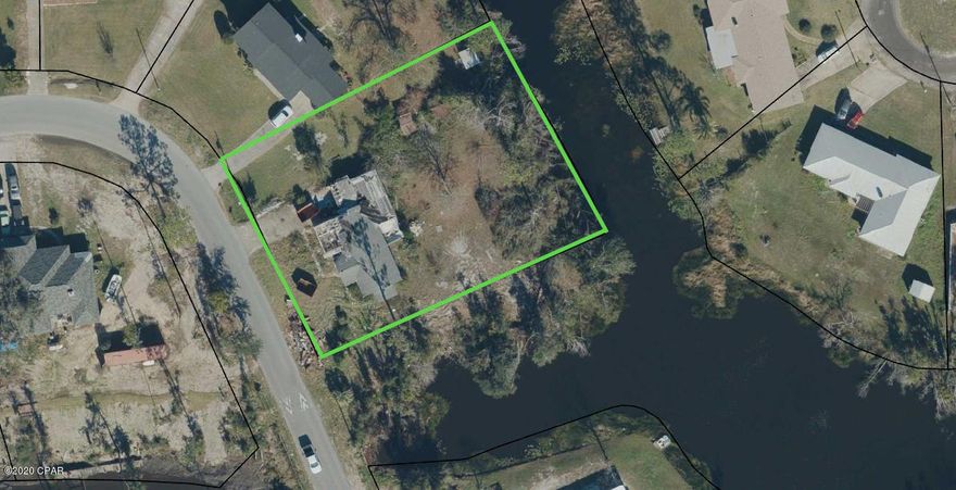 This waterfront property is clear and ready to build your dream home.  The lot is over 1/2 an acre located in the beautiful Island View Estates and has a fantastic view of the lake.  This property is located within minutes of shopping and Panama City Beach.  Property is in flood zone X.