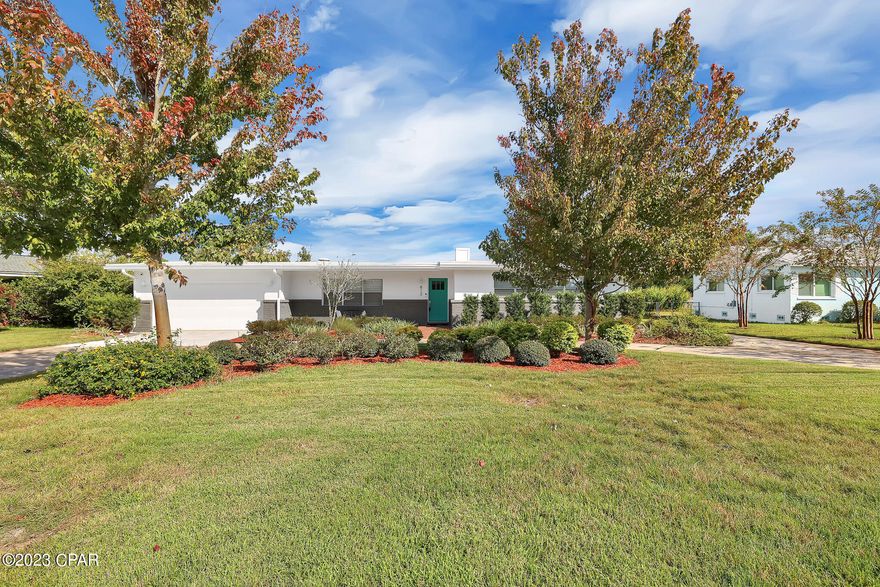 Looking for a home near St. Andrews restaurants and the bay? This is it! A pool, lovely covered deck and an extra kitchen set up for entertaining! This house is clean, updated and freshly painted. The landscaping is nice, plumbing has been updated and appliances are up to date as well. This house is great for entertaining, there is a pass through window in the kitchen and 3 access doors out to the pool. The pool deck was freshly painted and the mounted TV out there is great for entertaining. Kitchen boasts granite countertops, bathrooms have new vanities and did you see the fireplace? The fireplace can heat the whole house. The gas oven is very nice, people are always looking for a gas oven! House is not in a required flood zone and we will be glad to transfer the affordable insurance policy if needed. Schedule your showing today!!