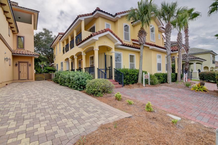 La Valencia townhouse, 3 BR's/3 Baths with BR on first floor. 1,615 SF. Nicely decorated with open floor plan and an incredible screened porch that you will absolutely love. There's even a small fenced back yard. Upstairs master has spacious bath, 8x9 walk-in closet and private balcony, additional upstairs en suite bedroom with balcony is bright and cheery. Wonderful family retreat, vacation rental or full time residence. La Valencia is a small gated neighborhood with mediterranean style architecture, clubhouse and heated pool reserved for owners, tennis courts and Gulf front pool. Located on the West End of Panama City Beach.