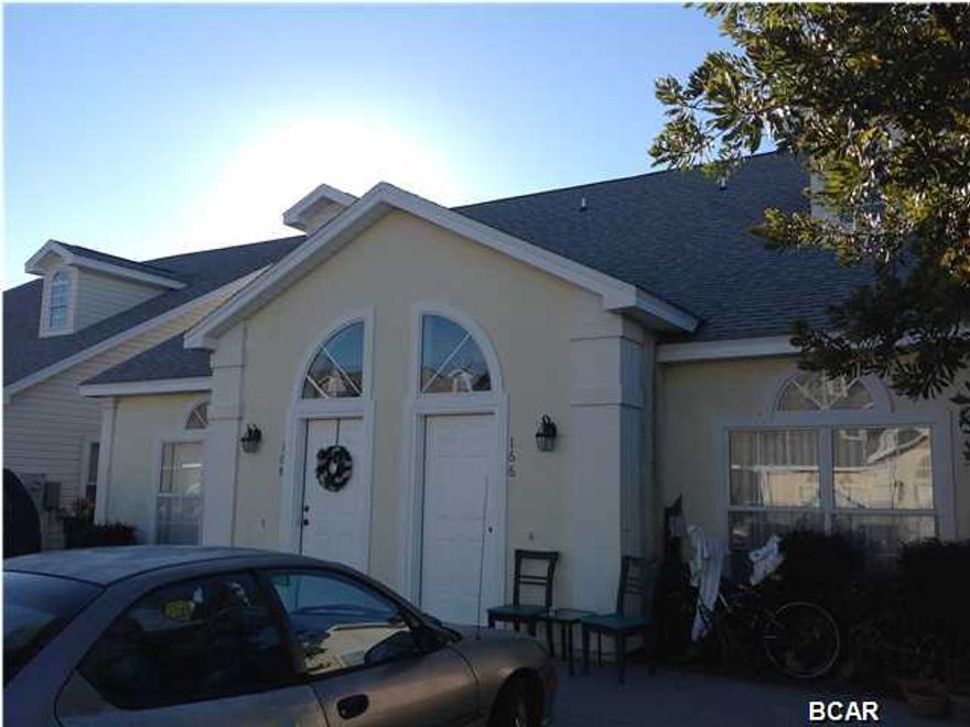 REDUCED and Back on the market.   Buyer financing fell through. Palm Cove is a community located within a minute drive to Front Beach Rd and the Gulf. This 3 bedroom 2.5 bath home has a Master Bedroom on the first floor with a private bath and the other bedrooms are upstairs. Wonderful open floor plan with all appliances in the kitchen and laundry area. This is a great vacation home or permanent resident.