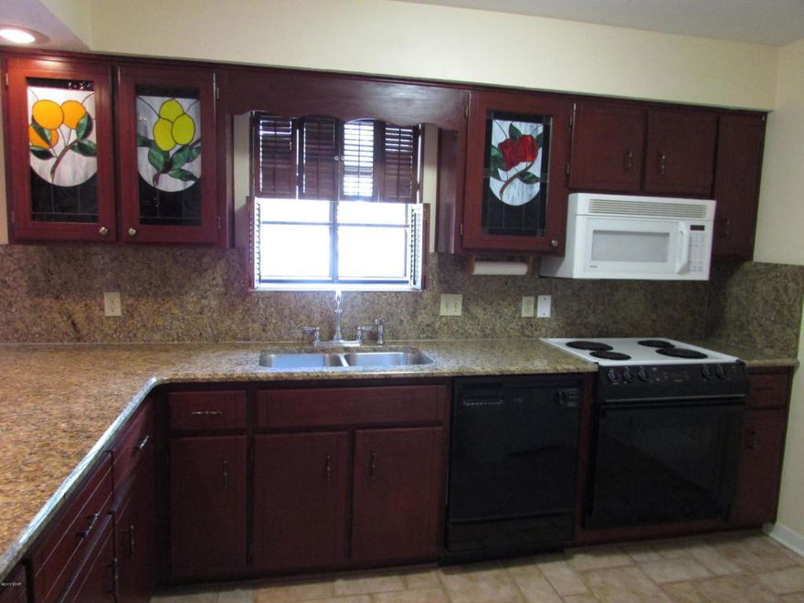 Elegant 2 bedroom, 2 bath rowhome. Beautiful hardwood floors, wood burning fireplace, granite countertops in kitchen, screened patio. Convenient location to park, bay and boating.  Converted garage for extra room. Small dog negotiable.