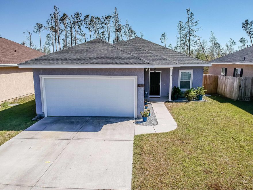 Home Sweet Home in Lynn Haven!   This home was built in 2013 and  offers 3 bedroom, 2 bath with a split bedroom plan.  The open living, dining and kitchen offers gorgeous laminate flooring, stainless appliances, subway tile back splash. and custom cabinets.



There is a 2 car garage, laundry room, 2 bedrooms and 1 bath at the front of the home.  The living area, master and master bath is on the back of the home.  The master is roomy with a walk in closet and the bath has separate shower and soaking tub.  



The back yard is completely fenced with a 6 foot privacy fence.   There is also a small covered porch in the back for a grilling area.



Stop by and see this home today with your favorite Realtor!