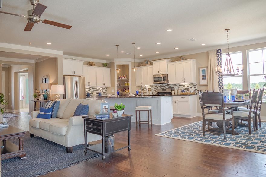 This home features the Anna Maria floor plan with a Classical Elevation. This house is a new construction Model Home Example and not the actual house being built. SB home shown has custom and optional features. Please ask agent for standard feature list.    SweetBay offers biking and hiking trails, a boathouse to launch canoes, kayaks and paddle boards, a permitted marina, community pool, several parks, ponds, children's playground, planned township with a major grocery store and many shoppes. Everything is within a 5 minute walk or less.  University Academy is the center of this beautiful community. The Academy is the #1 school for math and reading for the Bay County District. Your children are priority for enrollment with purchase of a home.