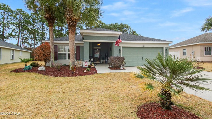 A rare opportunity to own this Newly Renovated home in Palmetto Trace! Home was renovated in 2020, new roof in 2019, AC in 2017, epoxy floor in garage. This home has a great open floor plan! Large open living area with raised ceilings,  wonderful kitchen with high ceilings and breakfast bar. All appliances including built-in microwave convey in kitchen with plenty of cabinets and large separate pantry. Large Master with walk-in closet and master bath with double vanity and new shower. Huge covered/enclosed patio off the of back of the home for grilling and relaxing. Very nice lot backs up to wooded area.  Just seconds to the Worlds Most Beautiful Beaches and Pier Park: this home is very close to area shopping, restaurants, doctors, dentists EVERYTHING YOU NEED! Community has two pools, pavilion, sidewalks and street lighting. Walk to Frank Brown park through the neighborhood where you will find tennis courts, basketball courts, softball fields and even a dog park! Don't forget Gayles Trails where you can walk for miles or go biking, running, rollerblading...you name it! This home won't last. Hurry! Hurricane shutters also convey with the home as well!