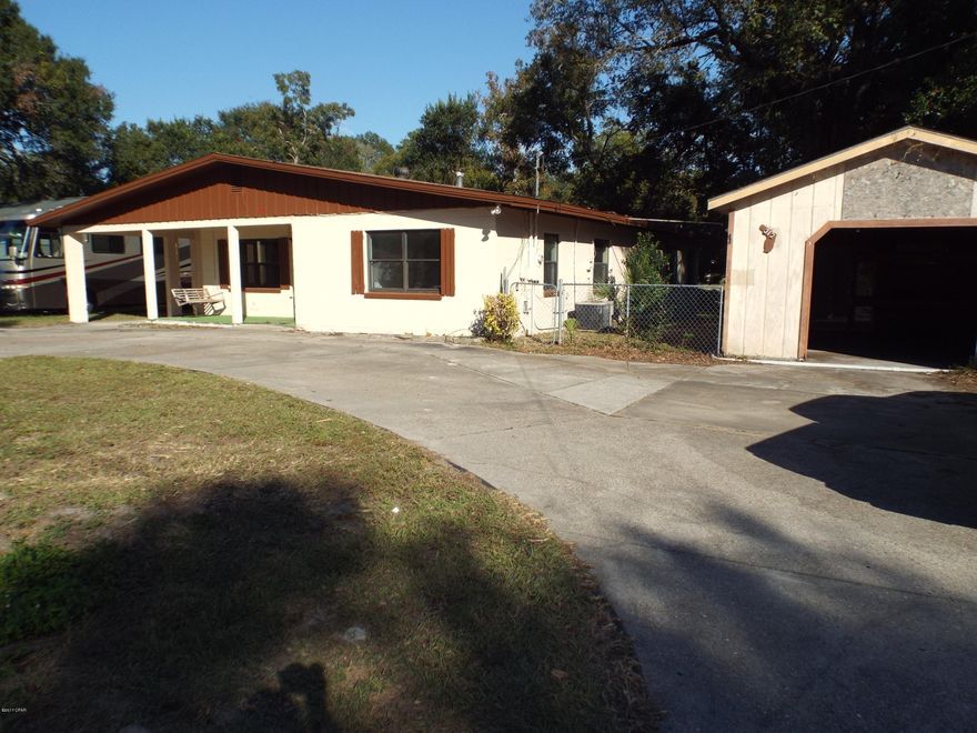 REDUCED AGAIN!!! Large three bedroom two bathroom home in Millville with bonus room, on 1/2 acre lot with two detached storage buildings offered as is.  The exterior features a circular drive large front porch with swing. The back yard is partially fenced and has plenty of room for a pool and kids toys. The master bedroom has its own bedroom and has a separate exit to the hallway and bonus room which has a good view of the  back yard.  All sizes are approximate or taken from other sources please verify accordingly.