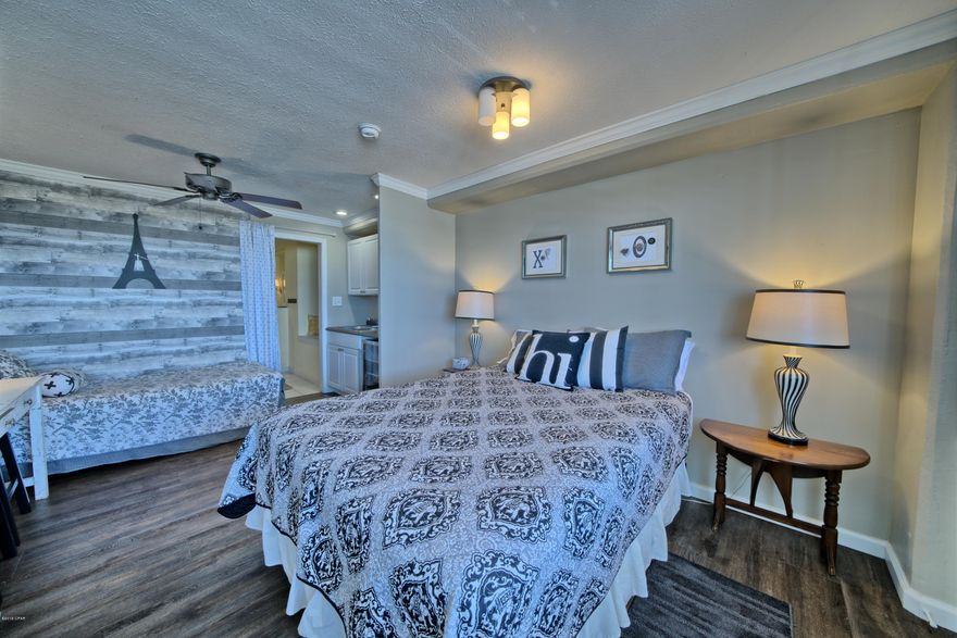 If you are looking for a great investment with a steady cash flow or a personal vacation getaway for you & the family ON THE GULF, this is it! This unit is a little oasis of nostalgia of Old Panama City Beach, featuring charmingly romantic tastefully updated decor. After a long day at the beach, take a soak in large 6 ft garden the tub by candlelight. Great location to restaurants, shops and entertainment. Amenities include pool, bbq grill, private upstairs owners lounge, covered & uncovered decks, elevator and an owners laundry. COA fees cover electricity, water, pest control, cable & internet. Great location to shops, entertainment & restaurants.