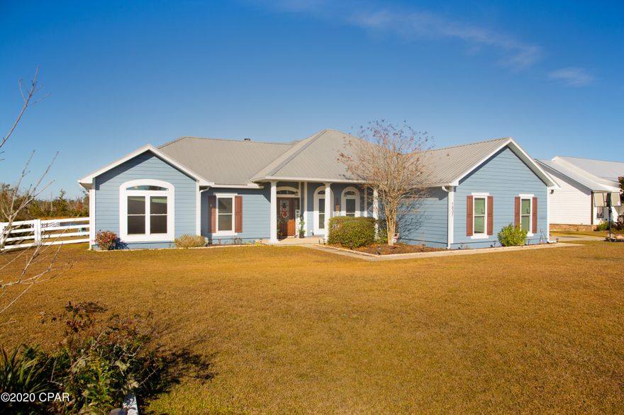 Beautiful 4BR/3BA home that is move-in ready! Country living at it's finest but also located close to shopping, restaurants, and TAFB. This home sits on 1.5 acres and has a stoked pond right in the backyard. Perfect for entertaining guest with its covered front and back porches, huge front/back yard with nice landscaping. Large brand new workshop located in the backyard is great for storage or working on your latest projects. All new windows and doors throughout home. Hardie Board Siding and Modern Metal Roof, Custom Kitchen and Bathroom Cabinets, Living Room with Twin French Doors on both sides of a Wood Burning Fireplace. Home has Large 16x16 Tiles throughout the main living area and Carpet in the bedrooms. Home features open Living Room with Tray Ceiling, Dining Room, Breakfast area with  Custom Built in Island with storage and shelves, Large Master Bedroom with Tray Ceiling, Two Closets in Master, Large Master Bath with Garden Tub and Shower, Guest Room with Full Bath with Walk-in Shower and Walk-in Closet, Large Bedrooms, Study/Bedroom with double doors and Laundry Room. Wide Baseboards throughout home and Crown Molding in Dining Room, Study/Bedroom and Foyer. Do not miss the opportunity to call the beauty yours. It will not last long!