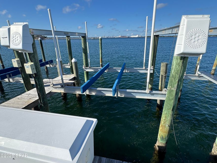 INCLUDES BOAT SLIP #15 (one of the four biggest slips)  FULLY FURNISHED.  High-end finishes including Sub-Zero refrigerator, Viking 6 burner stove with convection oven, Bosch dishwasher, ice maker and Sub-Zero wine chiller at the wet bar.  2nd floor condo with balcony that can see over the community pool to the bay.  NEW HVAC - 2022, NEW HOT WATER HEATER - 2019.   Alley-fed access parking and elevator.  Waterhaven is bay-front, gated community with a beautiful community building.