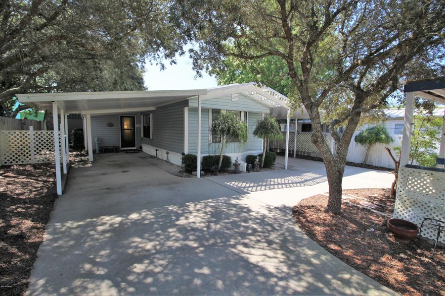 This beautiful Beach Retreat is absolutely adorable and a short walk or bike ride to the beach. The Owners have spared absolutely NO Expense on this home. Wow, what an amazing space with a large open living/dining/kitchen area. The grounds are wonderful. There's a ton of space both in and outside. You'll have plenty of room for parking with the spacious circular drive, and covered two covered carports. There are two exterior buildings for added storage, a wonderful covered porch, an outside shower and a gazebo in the front yard! approx. 968 ft under roof.