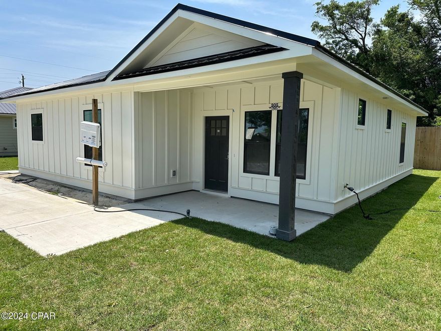 Welcome to your ''Like new'' home, Seller is offering up to 3% ($8550) Seller Concessions of sale price. * rate subject to change without notice ASK US ABOUT Affordable Housing loan - oers 100% ﬁnancing with no MI for a sales price up to $350,000. Perfectly situated on a spacious corner lot! This beautifully designed 3-bedroom, 2-bathroom residence offers 1,349 square feet of comfortable living space with thoughtful upgrades throughout. Highlights Include: Durable Hardi Board siding Stylish LVP flooring throughout Elegant granite countertops Designer subway tile shower in the master suite Spacious walk-in closet and large pantry Energy-saving spray foam roof insulation Low-E windows and glazing for improved efficiency Long-lasting Galvalume metal roofing Step inside to find 9-foot ceilings, luxury vinyl plank flooring, and gorgeous granite countertops that elevate the home's modern style. The open-concept layout makes entertaining easy, while natural light enhances every room. Built for both style and durability, the exterior features Hardie Board siding and a metal roof, delivering a sleek, low-maintenance finish that will last for years to come. Located just a short drive from Mexico Beach, Panama City Beach, and Tyndall Air Force Base (TAFB), you'll love the convenience of nearby shopping, dining, and coastal recreation. Whether you're settling down or looking for a low-maintenance investment, this home combines quality construction with everyday comfort in an convenient location. 301 Detroit Ave is also listed for sale and  vacant for $284,900.