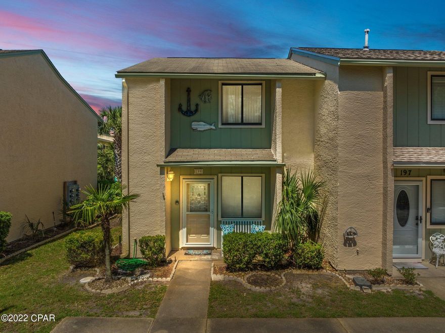 CURRENTLY UNDER CONTRACT, SELLER ACCEPTING BACKUP OFFERS. One of the larger end units in Gulf Highlands with 2 bedrooms and 2 bathrooms upstairs and half bath down with over 1300 sq ft. Great location in the complex close to the pool, and close to the back entrance which is convenient to the beach. LVP floors on the main level, enclosed patio is great for extra places to sleep with futon sofa bed. Master bedroom upstairs also has an additional enclosed sitting room with single futon chair that pulls out for sleeping.



Cheerful and happy decor. Turn key and ready for new owner. A solid vacation rental property managed by Panhandle Vacations. Rental history on file. 



This unit does has a locking owners closet and full laundry room inside. You can see the pool from the patio.