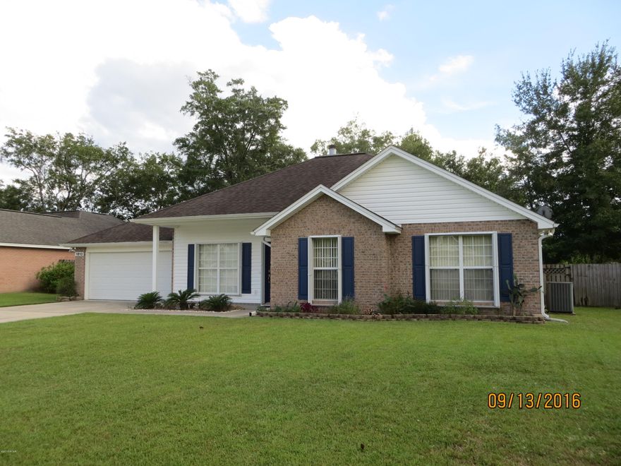 College Point!! Very well maintained, move-in ready home in desirable location.  Low maintenance exterior of brick with vinyl accents and trim. EASY HURRICANE SHUTTERS protect large windows and great natural light. Great room features 10' ceilings, crown mold and a wood burning fireplace. Beautiful front door with key pad lock-set. Updated HVAC with digital thermostat. Includes recently updated Refrigerator, Washing Machine and Dryer. Master suite features tray ceiling, large walk-in closet and whirlpool bath tub. Double garage has automatic door opener and a large utility room.  Big yard with lovely landscaping, sprinkler system and outdoor shower.  Privacy fenced back yard includes a sturdy, barn-styled storage building. Florida Room is very nice and is completely enclosed with insulated windows and door.  Easily add a mini-split heating and air conditioning system to add nearly 200 square feet to the home's living area. All measurements approximate and should be verified if important.