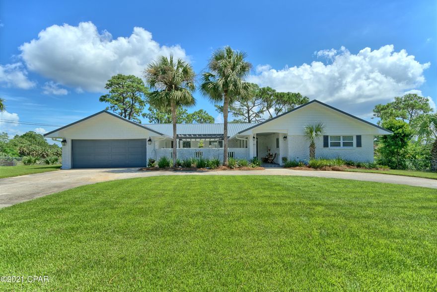 Must see listing so close to the beach and Pier Park!  Completely renovated to the studs, ceiling raised and vaulted to 10.5ft., all new dry wall, plumbing, electrical, quartz counters, new island with additional sink, new HVAC, new whole house generator, all new bathrooms with custom tiled showers, all new lighting, new exterior detail and paint, new metal roof, brick paver courtyard and patio.  List of improvements in documents.   Schedule your showing today!