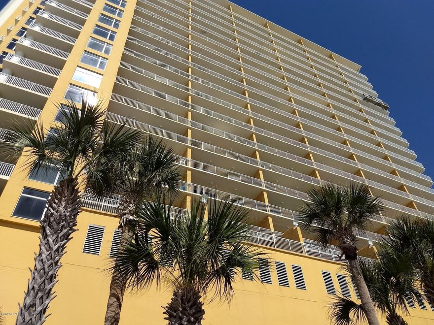 'CURRENTLY UNDER CONTRACT, SELLER ACCEPTING BACKUP OFFERS' Amazing open GULF FRONT views from this end unit with side windows that allow for both a Sunrise view from your living space and a sunset view from the living rm and Patio! Beautiful open foyer as you walk in. Two guest rooms and oversized guest bath are immediately accessible. Then enter the main living area boasting a bright open space with full dining area, open kitchen, storage and 2 pantries, granite counters, breakfast bar. Tile floors. Master bedroom has separate patio access, walk-in closet and large private bath with garden tub. Amenities include two beachside pools, gated beach access, elevated gym with Gulf View and a business/event center! Main floor garage parking, direct access to the beach and County Pier.