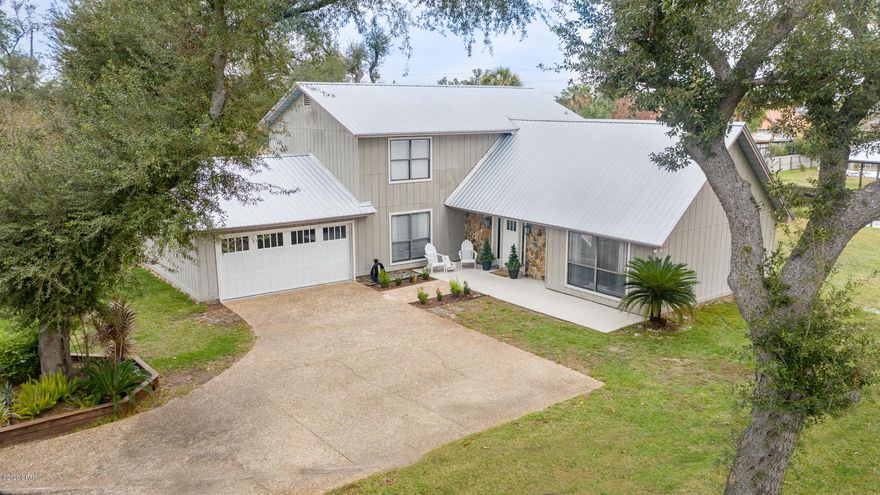 **UNDER CONTRACT, SELLER ACCEPTING BACK-UP OFFERS** Lynn Haven waterfront home on Upper Goose Bayou tucked away on a quiet cul-de-sac with deep water access to North Bay and just a short boat ride to the Gulf! With over 2200 sq ft, this home boasts 4BR/2.5BA with waterfront views from all first floor rooms and the master bedroom and bayou views from the north bedroom. Granite and marble kitchen and bathroom countertops and two living areas with plenty of open space. The garage is even a MUST SEE! Beautiful landscaping for great curb appeal and a 10K lb boat lift ready for your saltwater adventures.