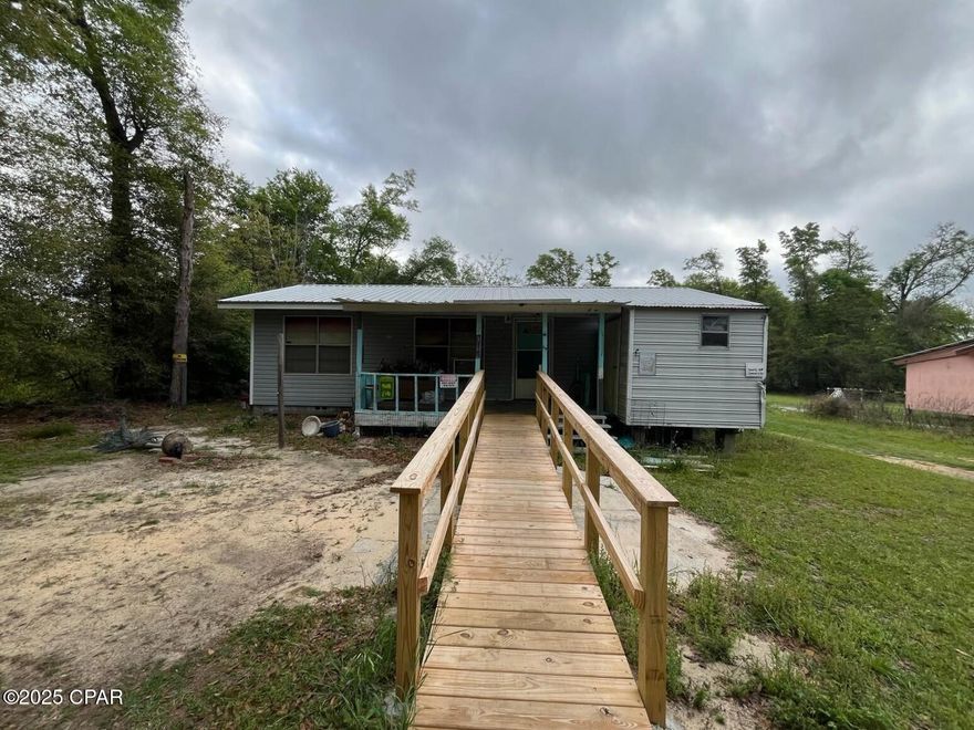 Come see this 3 bedroom, 1 bathroom Single Family Home in Marianna, FL! The property requires an interior renovation and a new HVAC system. The metal roof is in fair shape.  With an expansive backyard and easy access to Hwy 90, this property is in an excellent location for someone looking to live the quiet life!  Don't miss out on the opportunity to unlock this home's full potential!
