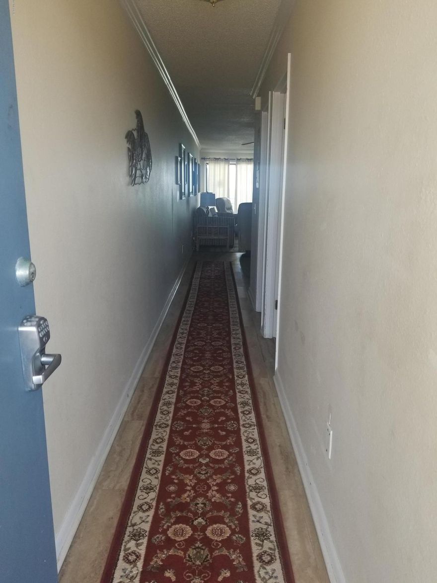 Whispering Seas is a 3 story low rise condo located on the east end of Panama City Beach. This specious 2 bedroom 2 bath is a beautiful end unit with a great view of the beach.