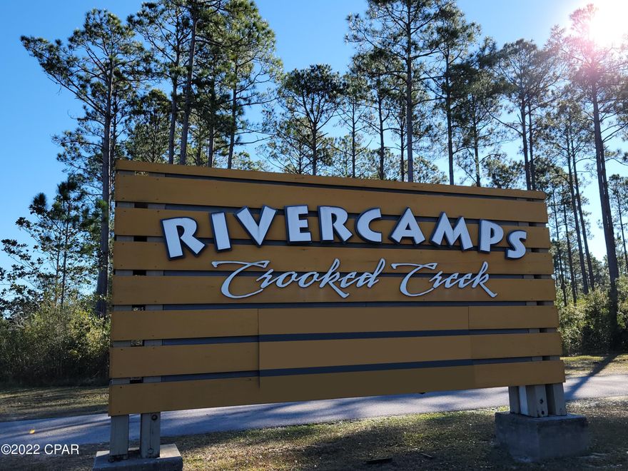 CURRENTLY UNDER CONTRACT, SELLER ACCEPTING BACKUP OFFERS. Welcome to RiverCamps. A fast growing premier gated community located a few minutes north of beaches.  This peaceful community is like a private wildlife sanctuary. This property is cleared and ready to build.  Approximately 1.02 Acre pond front.

Seller's have HOA approved Floorplan available.  The design is an open concept, split bedroom with approximately 2,383 Heated & Cooled living space. 3 bedroom, 2.5 bath. Separate oversized two car garage-approximately 536 SF, with attached covered breezeway entrance.  Covered front front and back porch areas.

The amenities include: activity community center, private boat ramp, community pool, hot tub, fitness center, pavilions, playground, and much more.