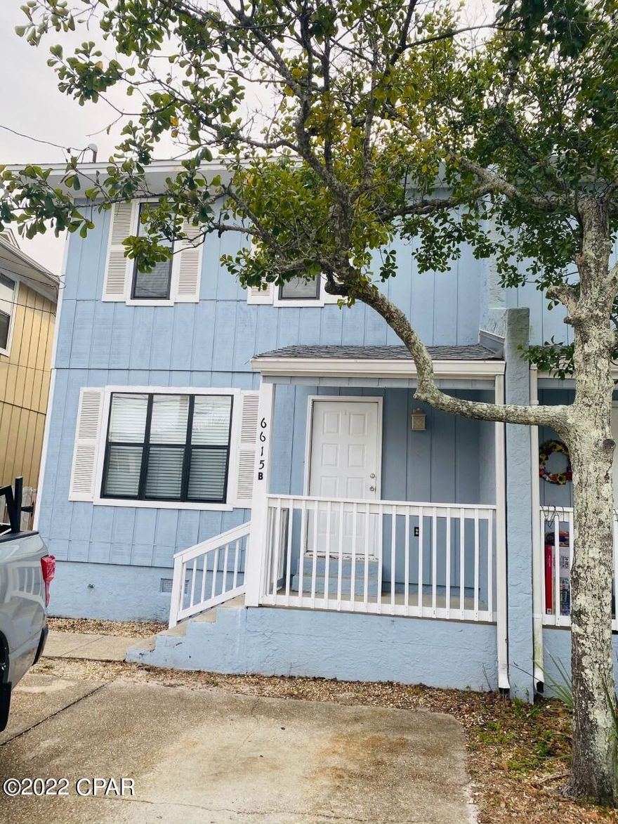 WALK TO THE BEACH! This 3 bedroom 1.5 bath town home is one and a half blocks to the beach - so just a short walk - located in the S. Lagoon/Thomas Drive area. Also close to restaurants, shopping, boat access, and much more. This townhome features small eat in kitchen area, fenced back yard, and a small deck off the spare bedroom looking south and west for nice sunsets.