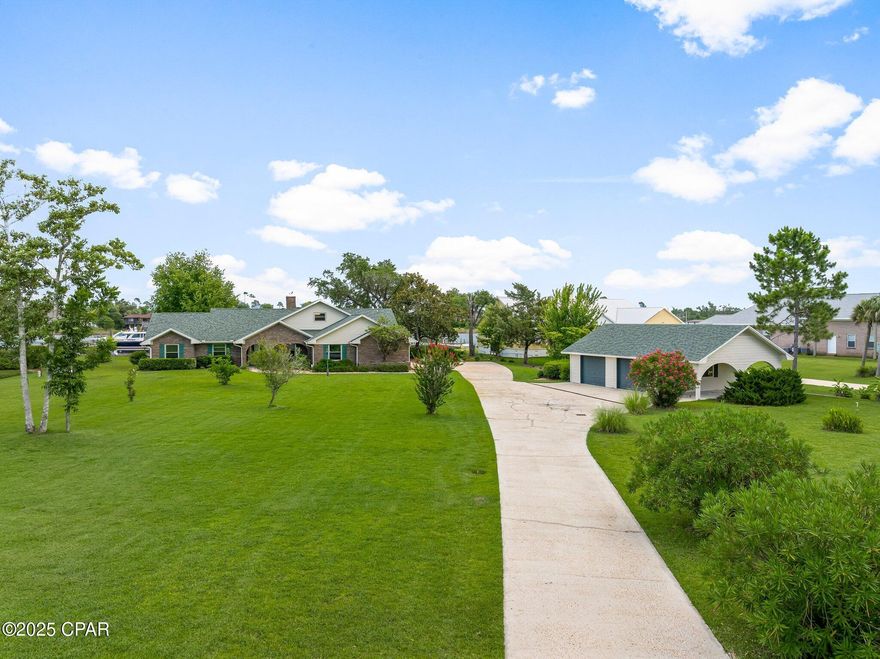 Nestled in the Waterfront community of Shoreline Estates located  on  Laird Bayou, this beautifully updated home offers an exceptional lifestyle with sunrise views and easy access to the water. Four bedrooms plus a hobby room in this 2800 square foot home has been thoughtfully renovated in 2020.
The open-concept living area flows seamlessly from room to room, perfect for entertaining or relaxing while taking in the waterfront views. The kitchen provides space for both cooking and gathering.  
With 120 feet of prime waterfront, this property provides direct access to East St Andrews Bay, the Intercoastal Waterway, and the Gulf of America, making it ideal for boating.
For those with a love of the outdoors, the home sits on a generous 1.37-acre lot, landscaped with a fully automated irrigation system. You'll find ample space for boat or RV parking, plus a 2-car garage, a detached 430 Square foot carriage house / workshop.
Whether you're looking to head to Shell Island from you dock, spend quiet evenings in the 17 x 17 Florida room, or enjoy the peaceful neighborhood, this property offers the ultimate in waterfront living.  Don't miss the opportunity to make this dream home yours!