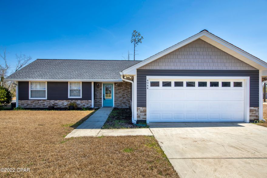 Like to go fishing? The closest boat landing on Deerpoint Lake is literally just .25 of a mile down the road! This 3 bedroom, 2 bath craftsman style home is well maintained and move in ready! Nice vaulted ceilings in the living area, freshly painted, new floors, new roof, new hot water heater and new siding. The floorpan is split giving privacy to the master suite. The living area is open and includes the family room with a wood burning fireplace, the kitchen and the dining area making it great for guest and entertaining. The home also offers a 2 car garage, a 1/2 acre corner lot, a large 12x20 storage building,  a sprinkler system and a pond! Super quiet neighborhood and just a short drive to town! Great for someone that wants the country living feel but not too far out from everything!
