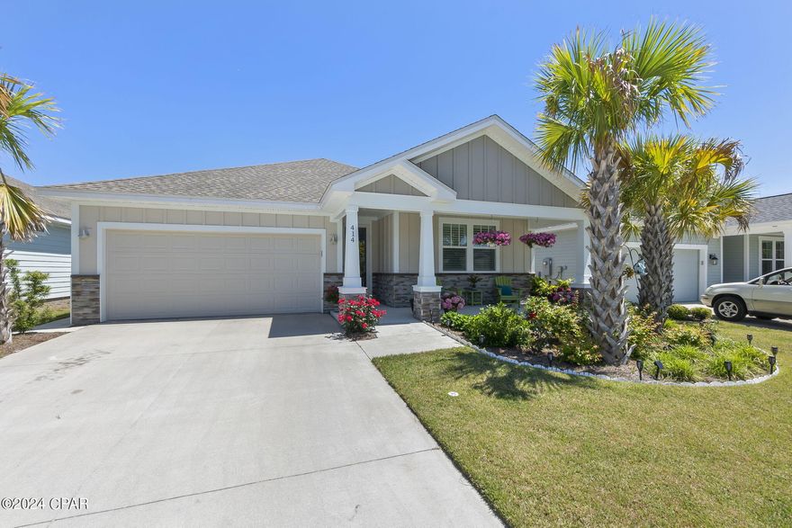 Welcome to the highly desired subdivision of Breakfast Point where you will find this beautiful well maintained newer construction home loaded with upgrades! This home has a welcoming coastal inspiration built and designed by Southern Coastal Homes. Additional upgrades include Vinyl plantation shutters installed in all bedrooms, luxury vinyl plank floor covering, storm door at front entrance, ceiling fans on patio and front bedroom and motion controlled rechargeable under cabinet lighting. The interior features a private foyer entrance and a large volume great room with an open floor plan. The kitchen has a center island containing the dishwasher and sink, a large walk in corner pantry, custom cabinetry with soft close doors and drawers, gas stove, beautiful backsplash, Quartz countertops and stainless steel appliances. The 3 bedroom 2 bathroom home has a split floor plan. The master suite features tray ceilings, over-sized walk in closet, an extra long soaking tub, separate tile shower and a double vanity with a Quartz countertop. Off of the living room, you will exit the French doors to find an inviting lanai with electricity and a storm door leading to the back yard. Outside, you will find a sprinkler system, a privacy vinyl fenced back yard with two (newly planted) lemon trees, nice grass and beautiful landscaping in the front and on sides of the home. Lastly, the garage floors have epoxy finish, a wash sink and attic access.