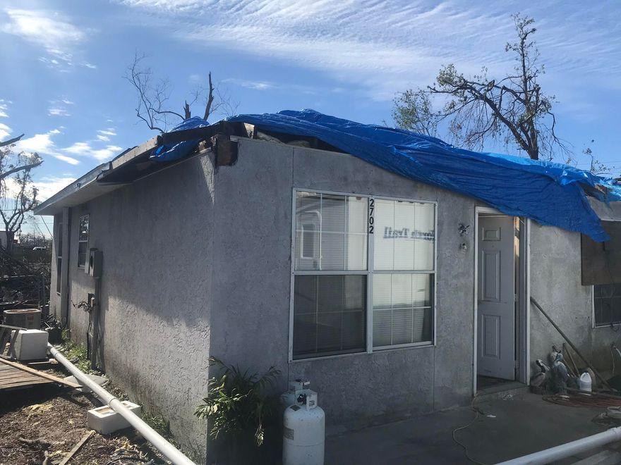 Opportunity Knocks! Hurricane Michael Damaged this 2 bedroom 1 bath stucco home located close to Bay Medical, Tyndall Air Force Base, water, and shopping. Investor opportunity to rebuild this home that is being Sold AS-IS, Where-Is, and is priced accordingly. Seller to make no repairs, demolition, disposal of debris, or clean up. All measurements are approximate, please verify if important.