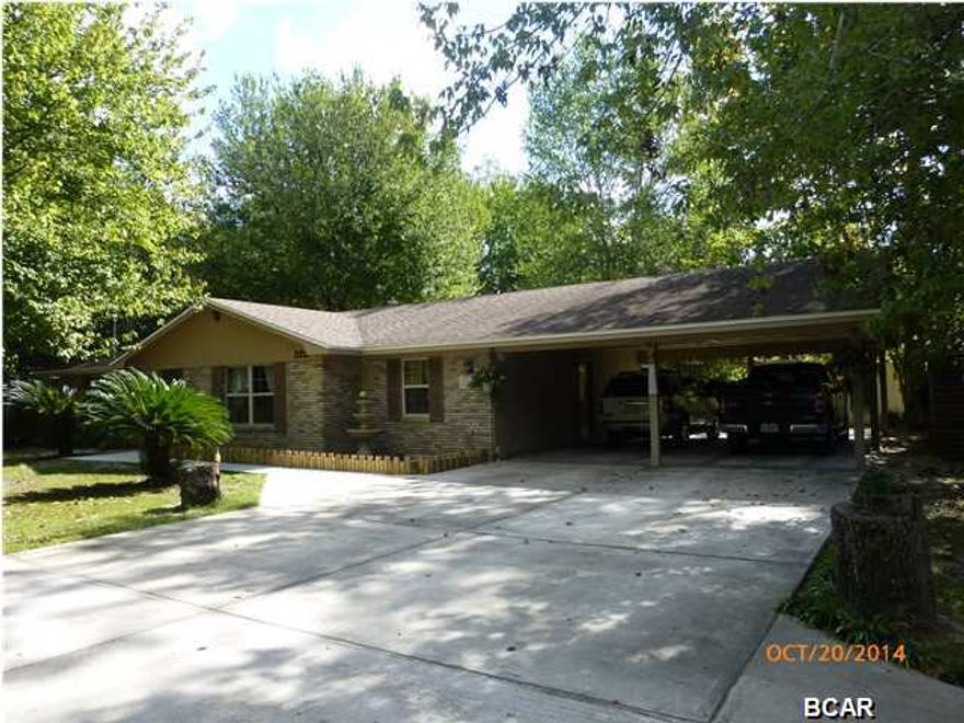You will be awed as soon as you step in! This well loved home is looking for a new owner! Dining room and kitchen are very spacious & are perfect for family life or entertaining. Kitchen counters & breakfast bar were replaced in 2011 and complement the cabinets. You will love cooking on the gas range and there are 2 pantries for all your kitchen supplies. 2 spacious bedrooms and baths are located on one end of the house. The 3rd bedroom is off the dining area & is currently being used as a dressing room/hobby room. The master bath features a shower,built in shelving for towels & linens and a closet The hall bath features a lg linen closet and it also connects to the 2nd bedroom. Low maintenance, easy care wood laminate (new in 2012)and vinyl tile throughout. From the dining rm you