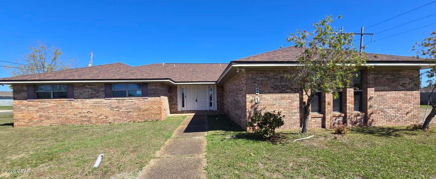 Welcome to your next big opportunity in the heart of Huntingdon Estates! This spacious six-bedroom, three-bathroom home sits on a generous corner lot spanning over half an acre, giving you plenty of room to stretch out and make this property your own.

Let's talk about what makes this place special. You've got a beautiful circular driveway that sets the tone right from the start, and the backyard is a private oasis complete with a privacy fence and an in-ground pool. Whether you're hosting summer cookouts or just floating around on a lazy Sunday, this outdoor space delivers.

Inside, you'll find over 3,300 square feet of living space with an open kitchen featuring granite countertops. Six bedrooms mean there's plenty of versatile space -- think guest rooms, home offices, hobby spaces, or whatever your heart desires. Three full bathrooms keep the morning routine running smoothly.

Now here's where it gets exciting. This home is being sold as-is, which means it's a fantastic canvas for buyers who love a good renovation project. Bring your vision and turn this already sizable home into something truly spectacular.

Location-wise, you're conveniently close to HCA Florida Gulf Coast Hospital, A. Crawford Mosley High School, and Florida State University Panama City. Northwest Florida Beaches International Airport is just a short drive away, making travel a breeze.

Homes like this -- with this kind of lot size and potential -- don't come around every day. Schedule your showing before someone else scoops it up!
 *Information provided is deemed reliable but is not guaranteed and should be independently verified by the buyer*