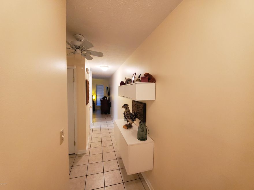 This is your opportunity to own your very own Rental Machine This tenant Occupied unit is Just steps from the Sugar Sand Emerald Beaches of Panama City Beach.  Located on the West end of Panama City Beach West of Hwy 79. And just off of Front Beach Rd. This 1/1 Condo has been meticulously maintained and beautifully updated.  Boasting tile throughout.  It features a Custom Galley style kitchen with butcher block breakfast bar and brilliant lighting.  The Bedroom is great sized and has ample closet space. The Bath has Tub/shower combo and great sized. Walk out the sliding glass doors to your ground floor patio.  Over looking the pools, Shuffleboard and more. This place has it all.   Call today to schedule your private showing!