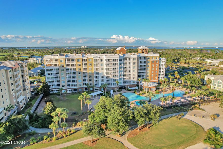 Gorgeous resort condo w/ balcony & shared hot tub/pool - near beaches/golf! 2BR/2BA with additional Queen Sofa-Sleeper (Sleeps Six). Elegantly decorated and wonderfully appointed with every necessity, newly furnished and rental ready. This is a 2BR/2BA easily accessible second floor unit with private balcony that overlooks St. Andrews Bay! Whether you choose to spend your days relaxing on nearby white sand beaches or at the neighboring spa, you'll always come home to beautiful views of the grounds, a private balcony, and resort amenities that include a hot tub and a 10,000-square-foot outdoor pool. This condo sits on St. Andrews Bay and the Jack Nicklaus designed golf course, world class tennis courts, 24-hour security, and will soon have again, a completely brand-new full-service marina. Completely refurnished and painted in 2018 and a NEW HVAC unit was installed in the fall of 2019. A new Stainless-Steel refrigerator was also purchased in 2019. All info is approximate and must be verified by Buyers if important.