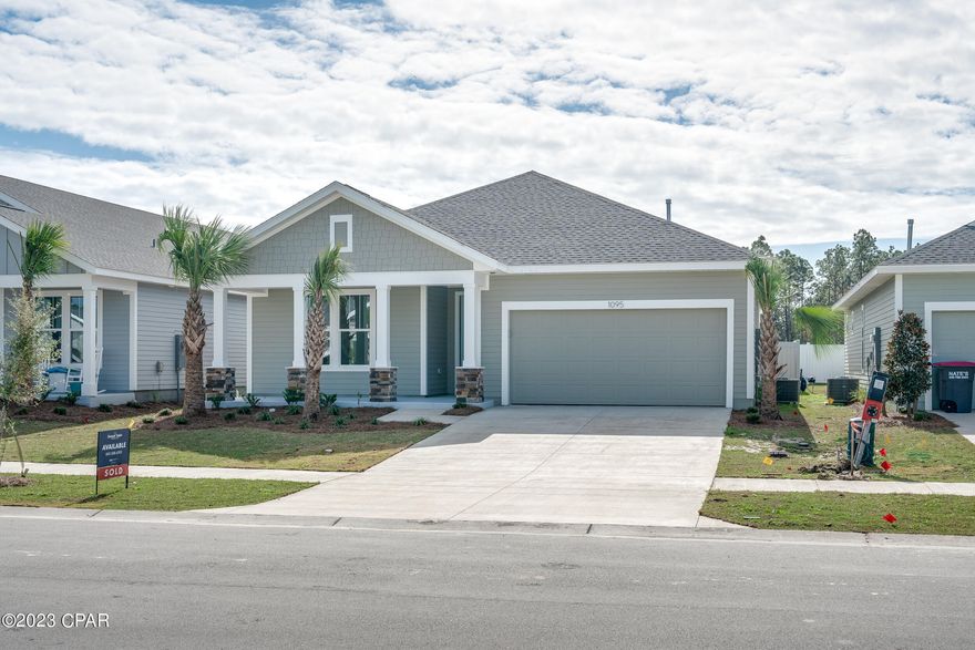 New Construction + MOVE-IN READY in the Breakfast Point East community! This Sand Dune plan from Fischer Homes is a spacious, open-concept design with just over 2,000 square feet of conditioned living space and a craftsman style exterior elevation. This home offers 3 bedrooms plus a separate study or flex room, 2 full size bathrooms, a 2-car garage, and a 10'x24' covered back porch. The wide-open living room, dining room, and kitchen area is filled with natural light and provides plenty of space to entertain. Luxury kitchen finishes include a large island, quartz countertops, upgraded shaker style cabinetry, tile backsplash, and Frigidaire® Gallery stainless steel appliances. Additional features of this home include luxury vinyl plank flooring in main living areas, high grade carpet in bedrooms, tile flooring in bathrooms, impact-rated windows and doors, and an upgraded primary bathroom with separate shower and garden bathtub and large walk-in closet. Embrace outdoor living with a large, 24.5' x 10' covered porch and a fully fenced backyard. This new home has also been designed to withstand up to 160MPH winds with structural steel framing.