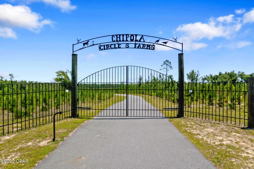 This magnificent property is located on the beautiful, Chipola River. This property consists of 300 acres. It features aprox. one and a quarter miles of riverfront property. 

*This property has a 4,000 square-foot main lodge with 3 bedrooms and 4 1/2 bathrooms, a fully equipped kitchen, and a large deck overlooking the river. The lodge could easily be used for hosting events such as wedding receptions, church retreats, or hunting events. 

*There are two bunk houses that could sleep up to 12 people each. Both bunkhouses are approximately 1,200 ft.Â². Both bunkhouses also have full kitchens and two full bathrooms each. Each bunkhouse also includes a large porch. 

*There is also a 1,500 square-foot screened in Pavilion that seats approximately 175 people It includes an efficiency kitchen with a built in Block Grill. 
*There is a maintenance and equipment storage building that is approximately 1410 ft.² enclosed with a shop and also features a 1930 ft.² pole barn for equipment storage. 
*This property features 2 shooting ranges, one of which is a 100 yard pistol and rifle range and one that is 925 yards with metal targets placed approx. every 100 yards, as well as an area for shooting skeet.
*This property is also an active tree farm. There are 3 food plots for deer hunting. Much of the property is high fenced. 
*This property also includes a Game Processing Building which is approximately 510 ft.². It has an efficiency kitchen a half bath, a walk-in cooler, a 400lb ice machine, and a 390 ft.² covered porch. 
*There is also an area that is used for releasing quail for small guided hunts. There is also a 537-acre tract (approx) that may be purchased in addition to this property. Located approx. 55 miles to the White Sandy Beaches of Panama City Beach. 50 miles to Dothan Al.,55 miles to Tallahassee Fl. and 14 Miles to Marianna Fl.  ***OWNER FINANCING AVAILABLE TO QUALIFIED BUYER***