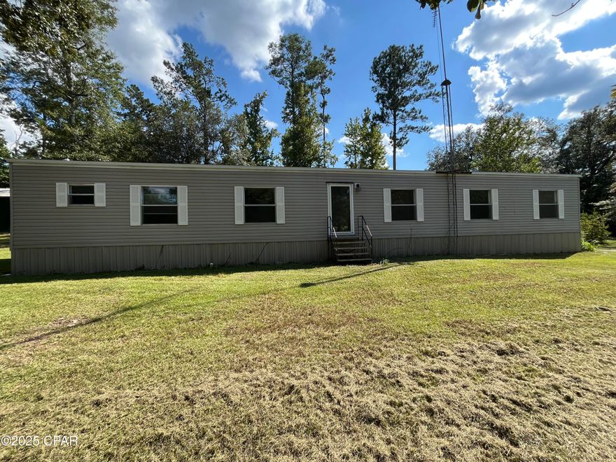 Updated 3BR/2BA Home on 1.4 Acres with Pond & Workshop - 5 Minutes from Downtown Marianna

Move-in ready and full of charm! This beautifully updated 3-bedroom, 2-bath mobile home sits on a spacious 1.4-acre lot surrounded by mature trees, fruit trees, and peaceful landscaping. Inside, you'll find a freshly painted interior, brand-new flooring, a new roof, and all-new appliances—making this home feel like new.
Step outside and enjoy the shared pond, which can be filled from the private well. Whether you enjoy fishing, relaxing by the water, or just the view, this is a rare find. Need storage or workspace? The 24x30 metal building with power and water is perfect for storing boats, tools, ATVs, or creating your own workshop.

This property is located just 5 minutes from downtown Marianna, giving you the best of both worlds—quiet country living with quick access to shops, schools, restaurants, and more.

Features:

3 Bedrooms / 2 Bathrooms

1.4 Acres with Mature Trees & Landscaping

New Roof, Paint, Flooring, and Appliances

Shared Pond with Well Access

24x30 Metal Building with Power & Water

Just Minutes to Downtown Marianna

Whether you're looking for a quiet homestead, investment opportunity, or weekend retreat, this one has it all.

Don't miss out—schedule your showing today!
